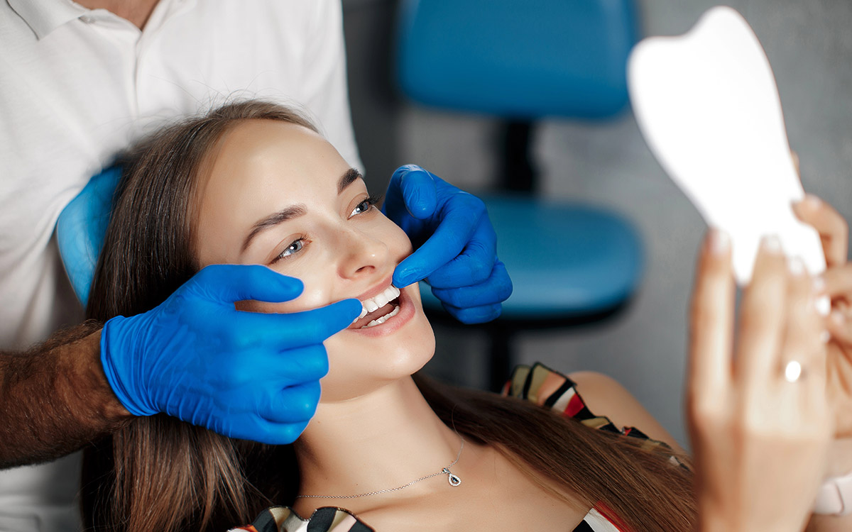 woman doing dental implants