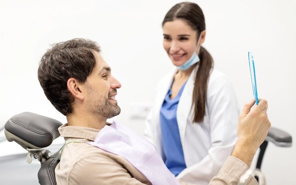 dentist-with-patient-smiling dentist with patient smiling