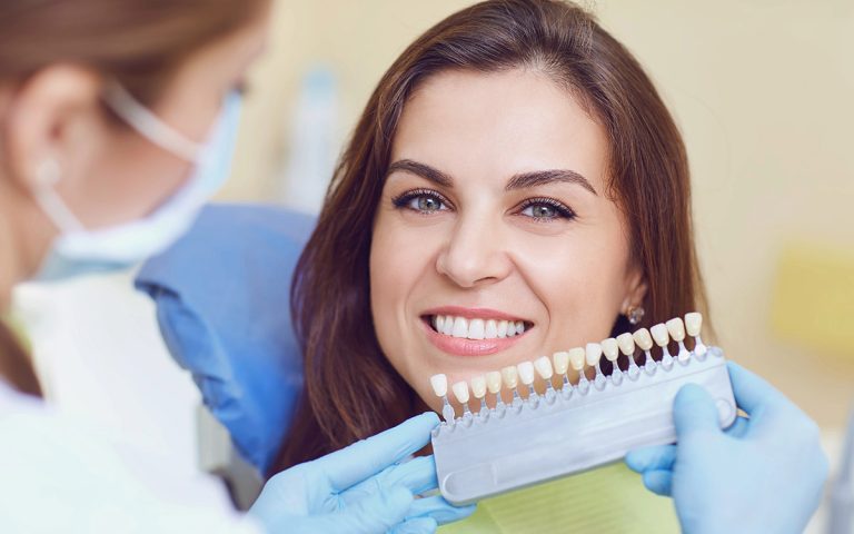 happy patient after dental implants