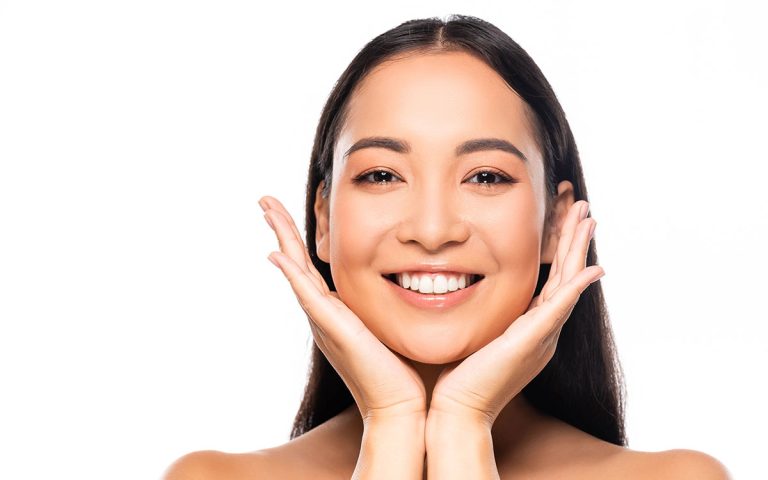 woman smiling after teeth whitening