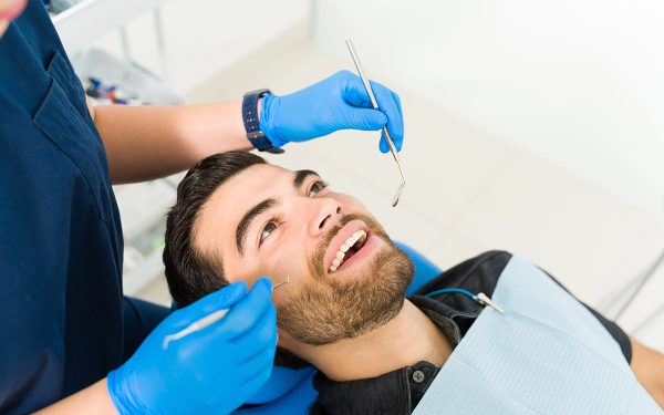 man at his dentist appointment