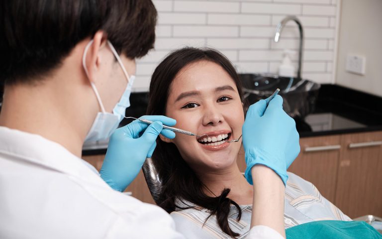 happy patient smiling at the dentist