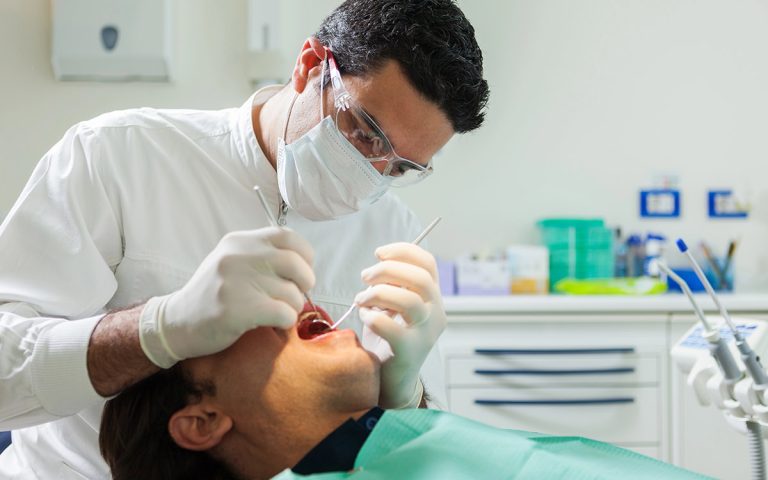 patient doing a Cosmetic Dental Treatment