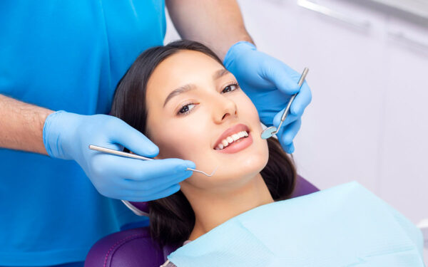 woman-at-the-dentist-for-cosmetic-procedure woman at the dentist for cosmetic procedure