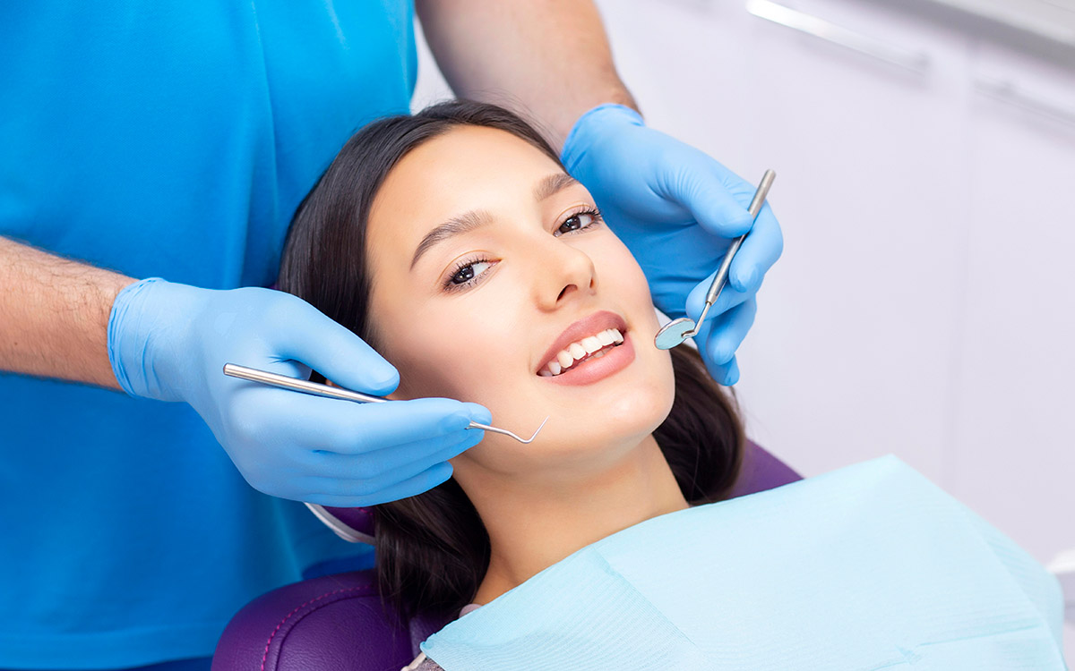 woman at the dentist for cosmetic procedure