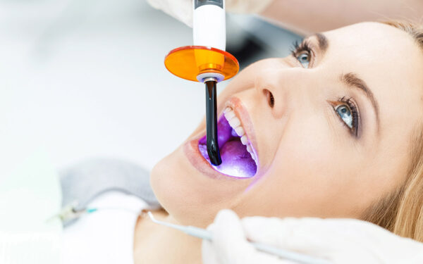 Patient-whitening-teeth-at-dentist Patient whitening teeth at dentist