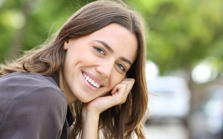 Happy woman with perfect smile and teeth